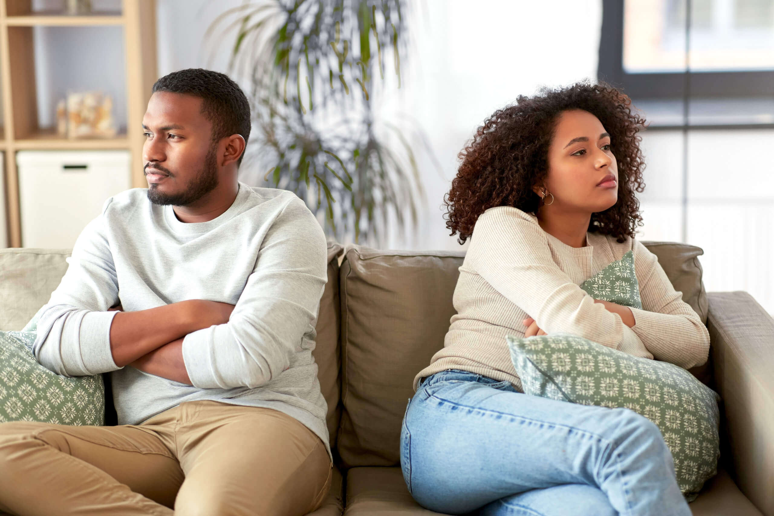 Couple in argument on couch Relationship tools for lasting change and clarity