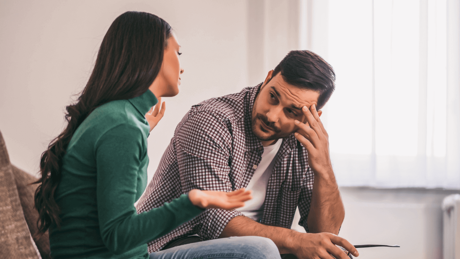 Couple in a serious discussion Helping individuals create powerful relationships